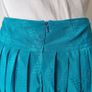 Vintage 1980s turquoise blue pleated midi length skirt. Made in Ireland by Michel Ambers, size 12. Image 7