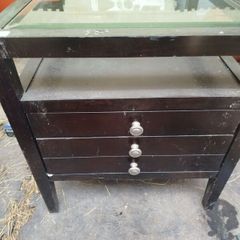 antique table with glass top drawers