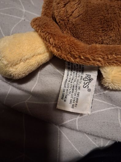 Turtle soft toy with large green eyes