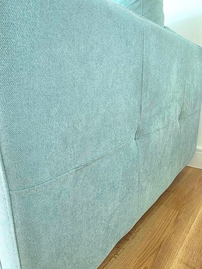 Sofa Bed. Sleeping fuction with Storage container. Comfortable sleep for your guests. High quality materials. Impeccable condition. Decorative pillows included.