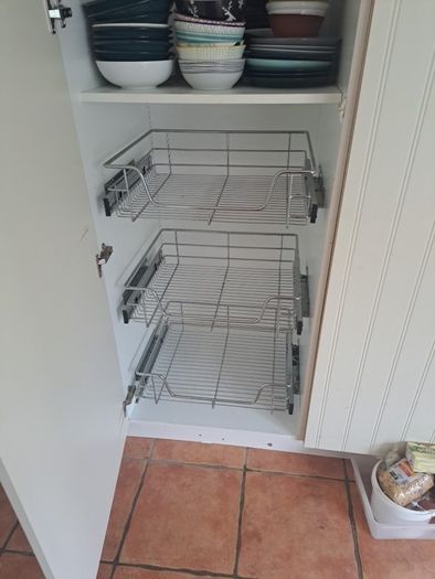 kitchen cabinet with baskets