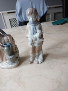 Porcelain  Figurines  X 2. Boy With  Lamb & Lady With Urn.