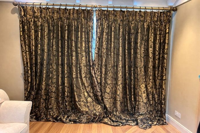 Pair of large lined black and gold curtains