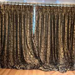 Pair of large lined black and gold curtains