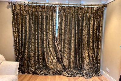 Pair of large lined black and gold curtains