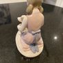 Annie Rowe figure girl brushing dog Image 5