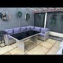 L shaped rattan sofa and glass top table Image 2