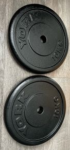 10kg  x 4 York standard 1" diameter weight plates