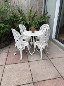 cast iron table and chairs