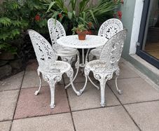 cast iron table and chairs