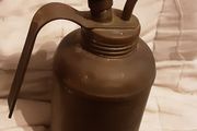 small vintage indoor watering can