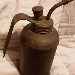small vintage indoor watering can