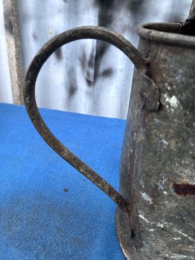 Vintage galvanised watering can