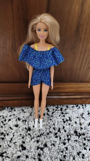 Barbie with car.