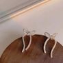 Ribbon Bow Silver Color Drop Earrings material metal Image 3