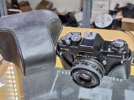 main image for ad Praktica B100 electronic Pentacon 50mm f/2.4 MC SLR 35mm Film Camera