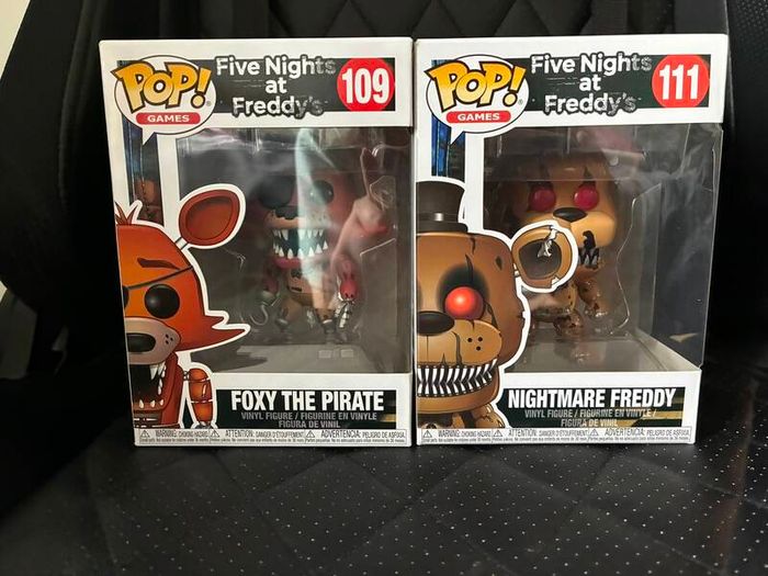 Five Nights at Freddys plushies and dragon figures