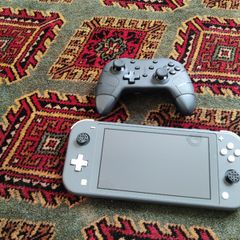 Nintendo switch with 20 games on it plus wireless controller