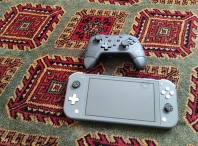 Nintendo switch with 20 games on it plus wireless controller