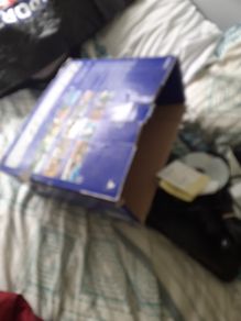 ps2 two controllers two siningin micks and 3 games in cludes singstar