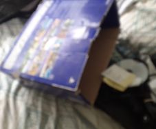 ps2 two controllers two siningin micks and 3 games in cludes singstar