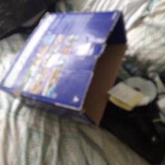ps2 two controllers two siningin micks and 3 games in cludes singstar