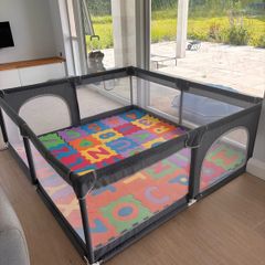 2mx1.8m Playpen with floor tiles, balls and pulls.