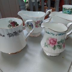 Four Good China Milk Jugs