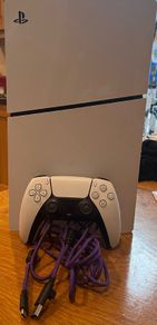 PS5 Digital with 1 Dual sense controller and steering wheel