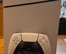 PS5 Digital with 1 Dual sense controller and steering wheel