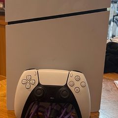 PS5 Digital with 1 Dual sense controller and steering wheel