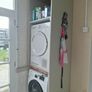 Sage green presses utility room Image 6