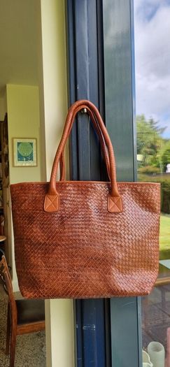 brown leather woven shoulder bag
