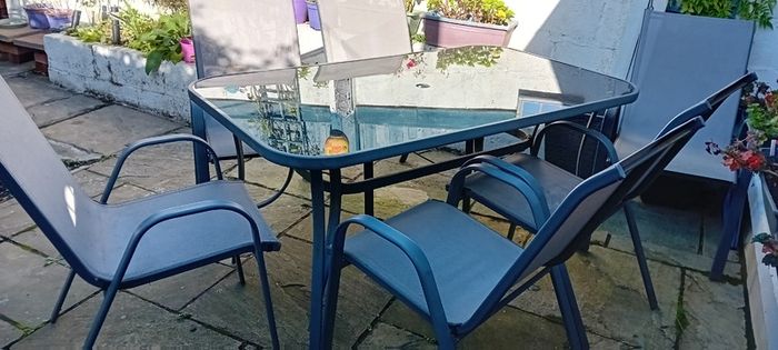 Glass top Garden table and chairs