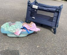 Dolls cot, clothes and bath