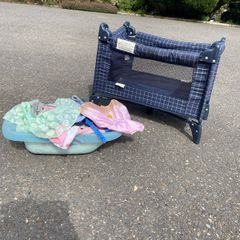 Dolls cot, clothes and bath