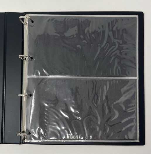 Stanley Gibbons Malvern Wine 4-ring album with 10 first day cover pages.