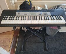 Casio CTK-1550 61-Key Digital Keyboard with Adjustable Stand