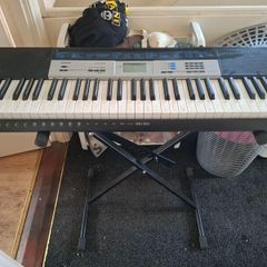 Casio CTK-1550 61-Key Digital Keyboard with Adjustable Stand