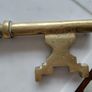 Antique solid brass ornamental key 35cm in length Image 5