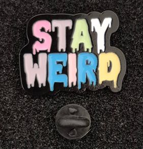 Stay weird,  pin back badge.