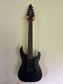 Jackson JS22-7 Dinky 7-string electric guitar in Satin Black