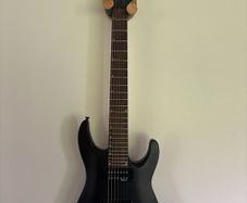 Jackson JS22-7 Dinky 7-string electric guitar in Satin Black