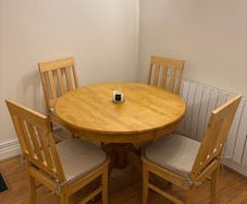 Round solid pine dining table with 5 chairs