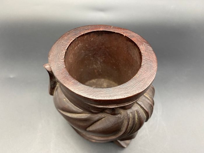 Chinese carved hardwood brush pot, carved with a Chinese Man
