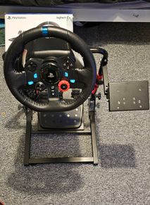 Logitech G29 steering wheel and stand