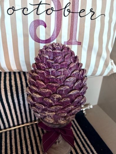New bespoke oversized autumn Pinecone on distressed wood base in mulberry