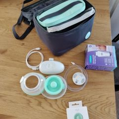 elvie wearable breast pump, carry bag and spare part, hardly used.