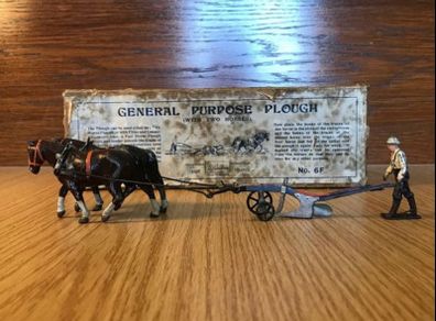 Britain's farmer general purpose plough and farmer Lead 6F toy 1/32 boxed  (Lot 1)