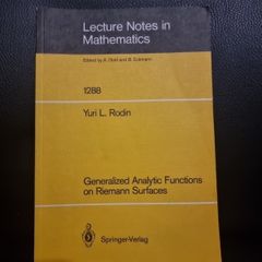 Generalized Analytic Functions on Riemann Surfaces